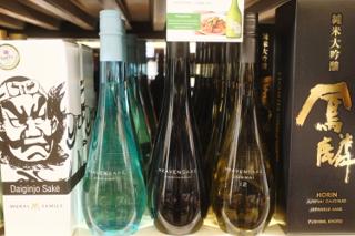 Sake bottles lined up on a shelf, with the punny name “Heavensake”.
