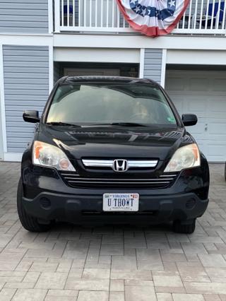 Sake bottles lined up on a shelf, with the punny name “Heavensake”.