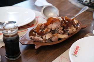 A platter with chopped-up lechon.