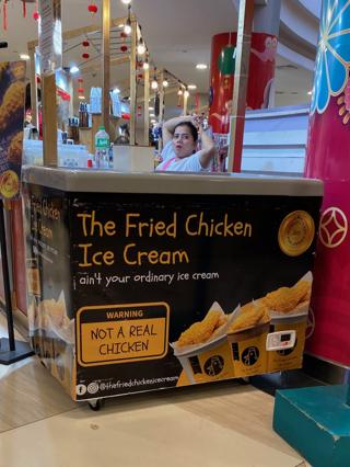 Bundles of lychee at a street vendor stand.