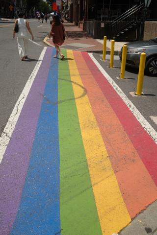 A rainbow crosswalk.