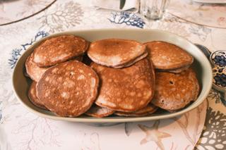 A serving dish full of mochi pancakes.