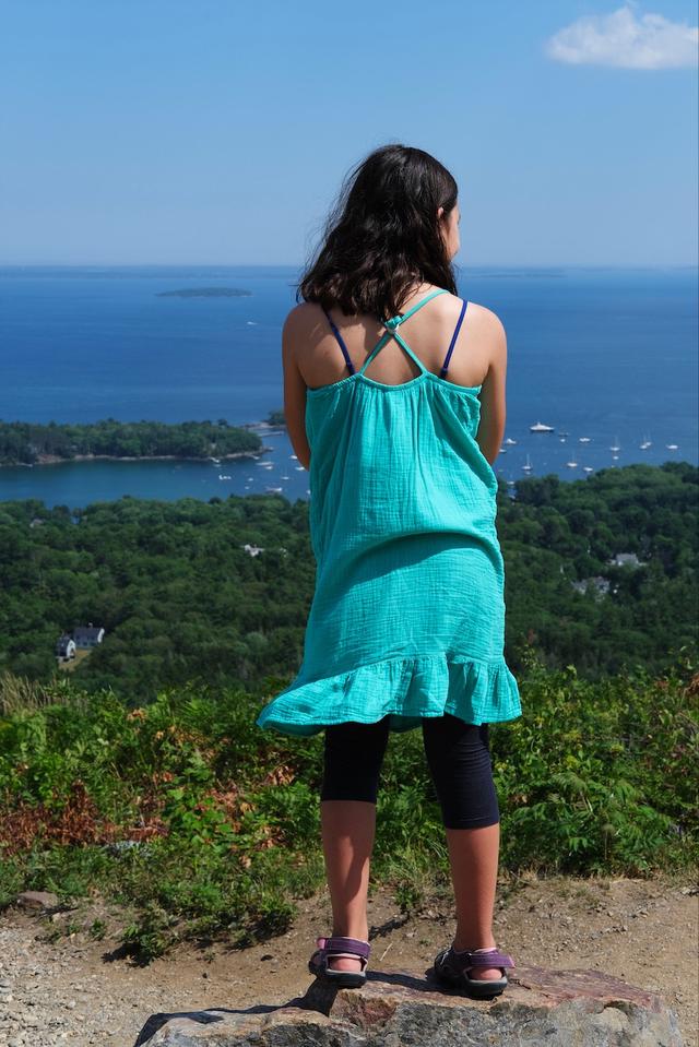 Girl looking out at Camden harbor.