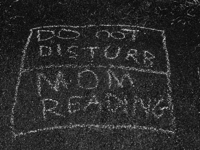 Chalk sign reading: Do Not Disturb