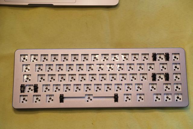 Bare keyboard mounting plate.