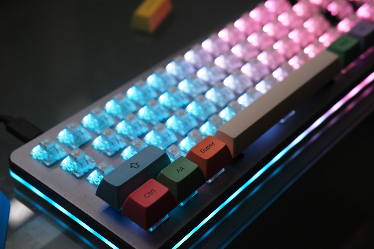 SA Chalk modifier keycaps. Keyboard with a few keycaps installed.