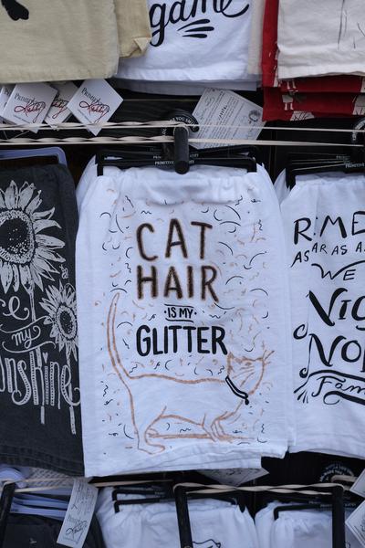 Kitchen towel with “Cat Hair is my glitter” illustration and lettering