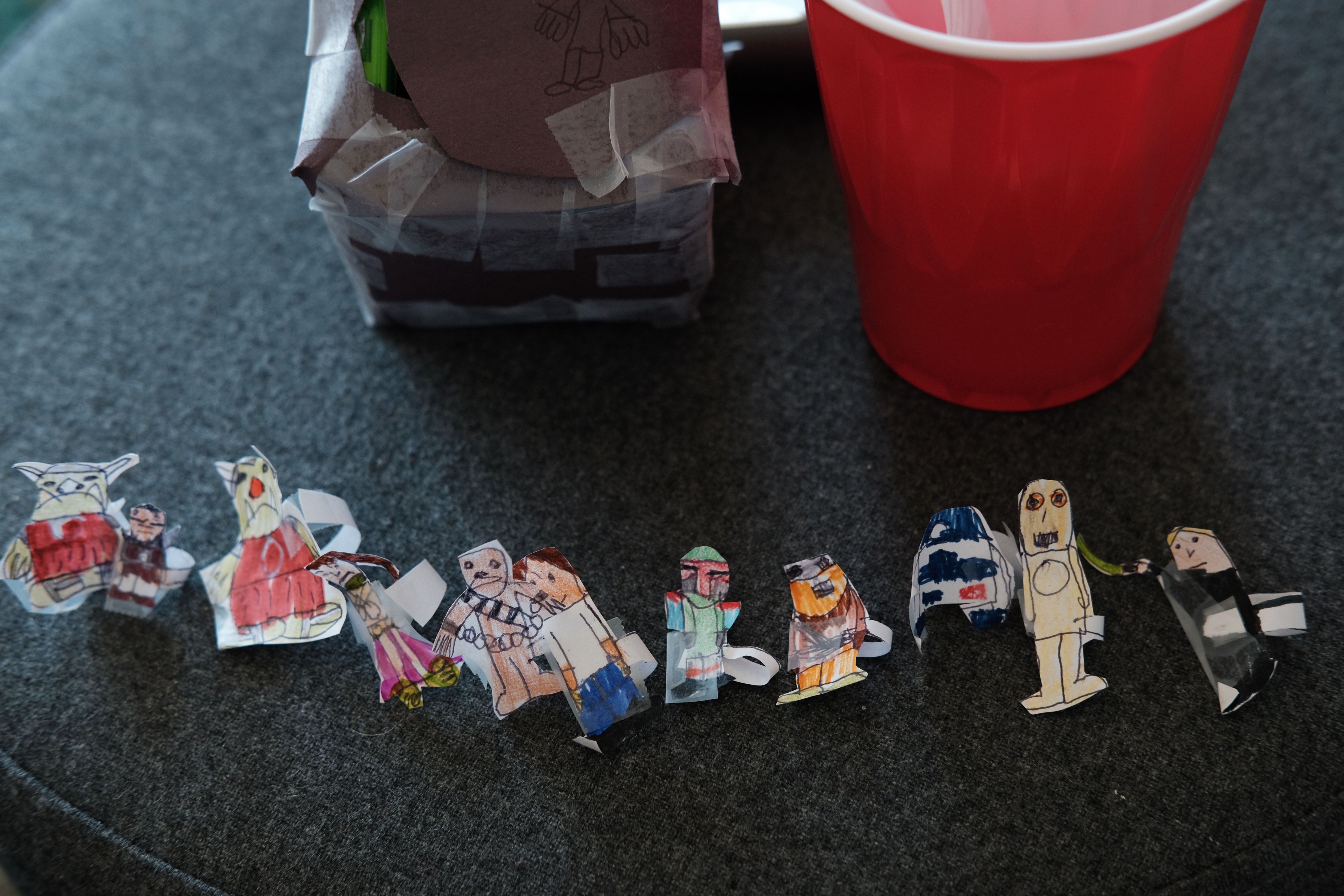 Papercraft Star Wars cast A lineup of paper puppet versions of Star Wars characters.