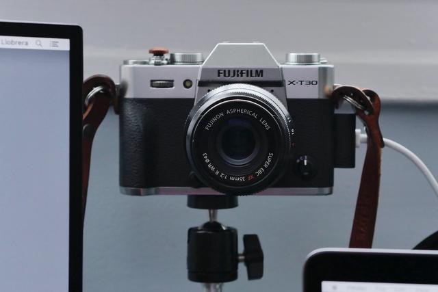 Fujifilm X-T30 on a mounting rod.