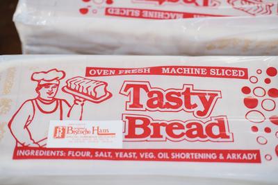 Loaf of white bread branded Tasty Bread.