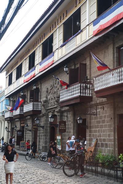 A cobblestone street outside Casa Manila Museum, a historic house from the mid-1800s.