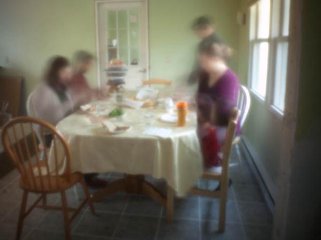 Long-exposure pinhole shot of a dinner table