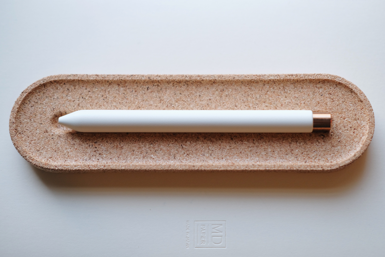 I went with the White/Copper option. View of white/copper pen in a cork holder.