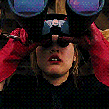 GIF of scene from The Brothers Bloom, with Bang Bang lowering binoculars while saying "Fuck Me."